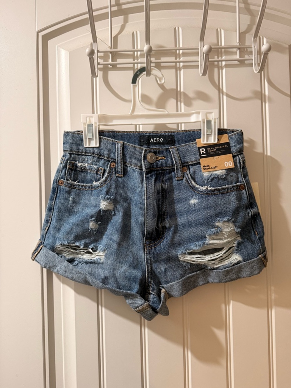 Aeropostale Women's Distressed Rolled Cuff Denim Shorts in Blue